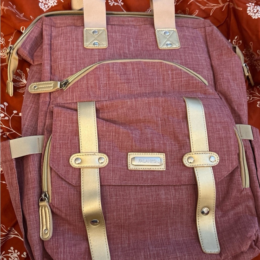 Like New Women Pink and Gold Backpack with lots of storage space